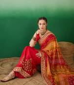 Riva enterprise women's soft mose chiffon with bhandhani print with heavy lace saree with blouse