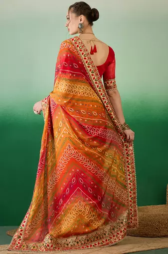 Riva enterprise women's soft mose chiffon with bhandhani print with heavy lace saree with blouse