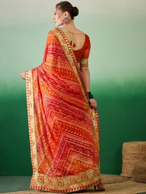 Riva enterprise women's soft mose chiffon with bhandhani print with heavy lace saree with blouse 4