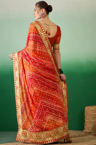 Riva enterprise women's soft mose chiffon with bhandhani print with heavy lace saree with blouse