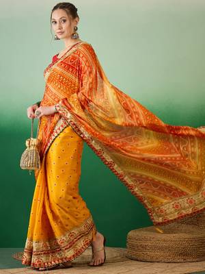Riva enterprise women's soft mose chiffon with bhandhani print with heavy lace saree with blouse 1