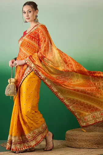 Riva enterprise women's soft mose chiffon with bhandhani print with heavy lace saree with blouse