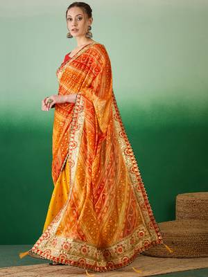 Riva enterprise women's soft mose chiffon with bhandhani print with heavy lace saree with blouse 3