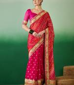 Riva enterprise women's soft mose chiffon with bhandhani print with heavy lace saree with blouse