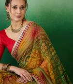 Riva enterprise women's soft exclusive georgette with bhandhani print with heavy lace saree with blouse