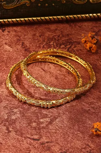 Intricately Carved Gold-Plated Bangles for a Regal Look