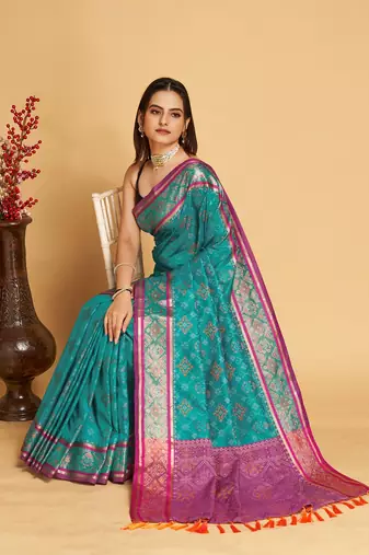 Teal Woven Patola Silk Blend Saree With Blouse Piece