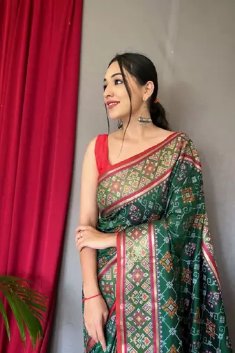 Green Woven Patola Silk Blend Saree With Blouse Piece