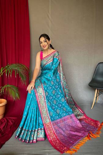 Teal Woven Patola Silk Blend Saree With Blouse Piece