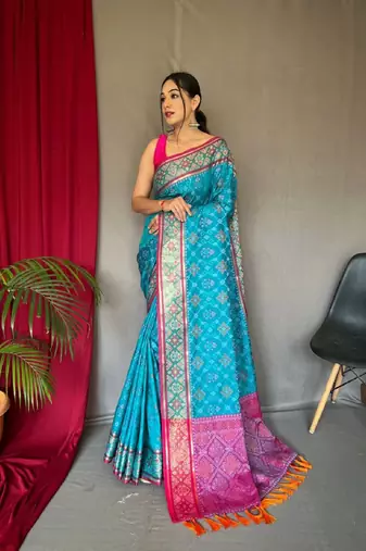 Teal Woven Patola Silk Blend Saree With Blouse Piece