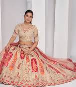 luxurious silk beautiful peacock embroidery in Flamingo Pink colours  bridal lehenga.