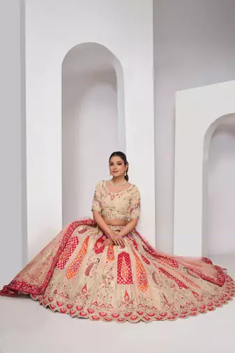 luxurious silk beautiful peacock embroidery in Flamingo Pink colours  bridal lehenga.