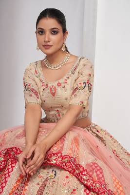 luxurious silk beautiful peacock embroidery in Flamingo Pink colours  bridal lehenga. 4
