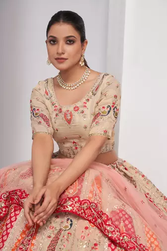 luxurious silk beautiful peacock embroidery in Flamingo Pink colours  bridal lehenga.