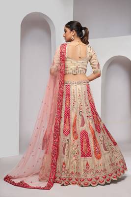 luxurious silk beautiful peacock embroidery in Flamingo Pink colours  bridal lehenga. 5