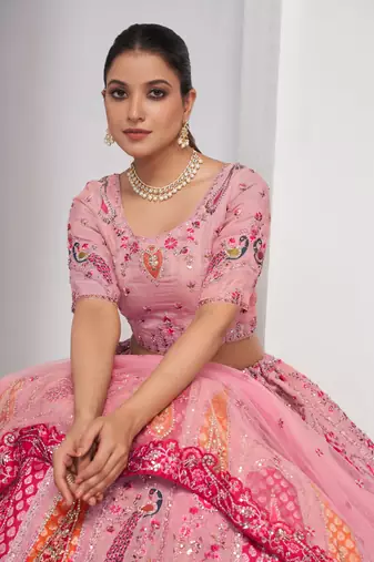 luxurious silk beautiful peacock embroidery in Flamingo Pink colours  bridal lehenga.