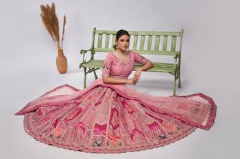 Bridal Pink lehenga is made with Orgenza Silk fabric and features intricate paisley Motifs 2