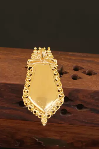 Kerala style gold plated temple palakka pendant
