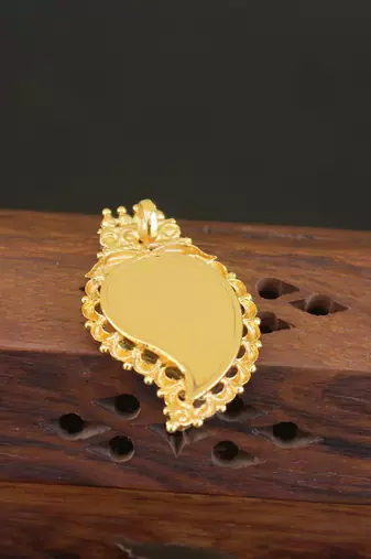 Kerala style gold plated palakka krishna pendant