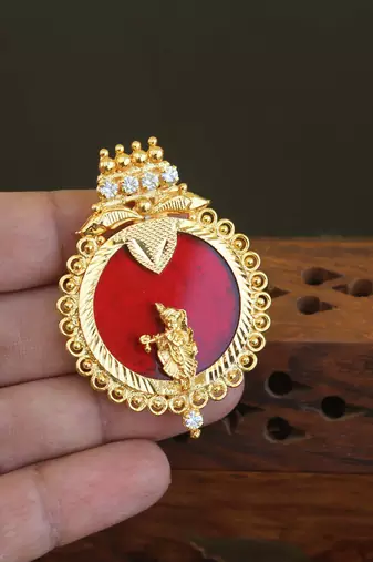Kerala style gold plated palakka krishna pendant