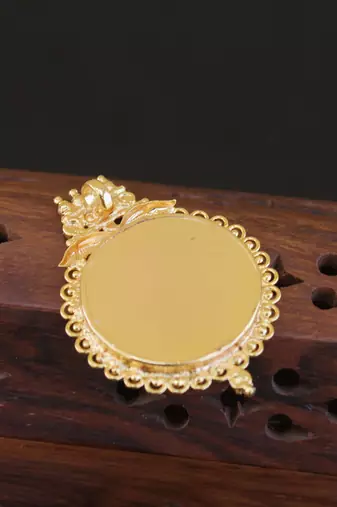 Kerala style gold plated palakka krishna pendant