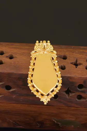 Kerala style gold plated palakka krishna pendant