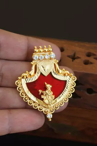 Kerala style gold plated palakka krishna pendant
