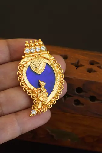 Kerala style gold plated palakka krishna pendant