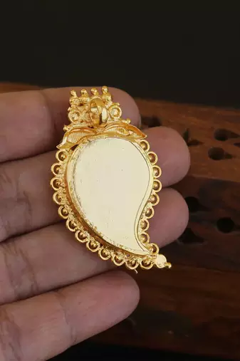Kerala style gold plated palakka krishna pendant