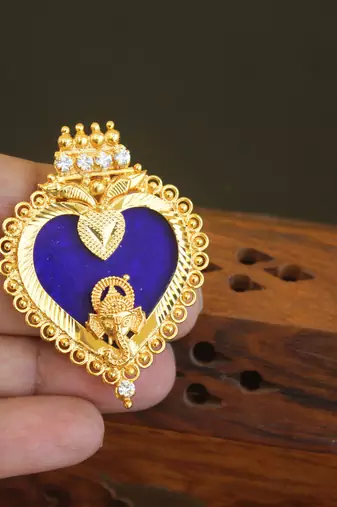 Kerala style gold plated ganesha palakka pendant