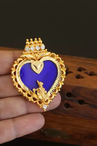 Kerala style gold plated palakka krishna pendant