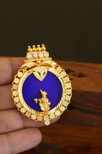 Kerala style gold plated palakka krishna pendant