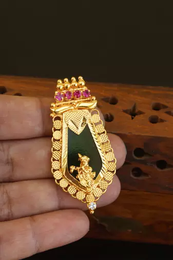 Kerala style gold plated palakka krishna pendant
