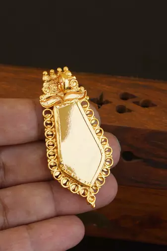 Kerala style gold plated palakka krishna pendant