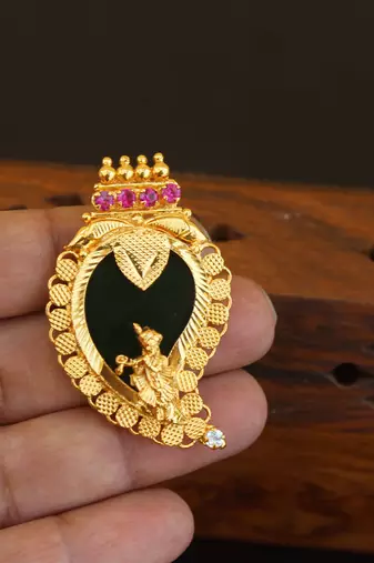 Kerala style gold plated palakka krishna pendant
