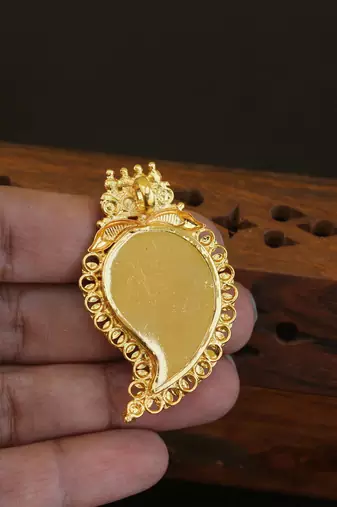 Kerala style gold plated palakka krishna pendant