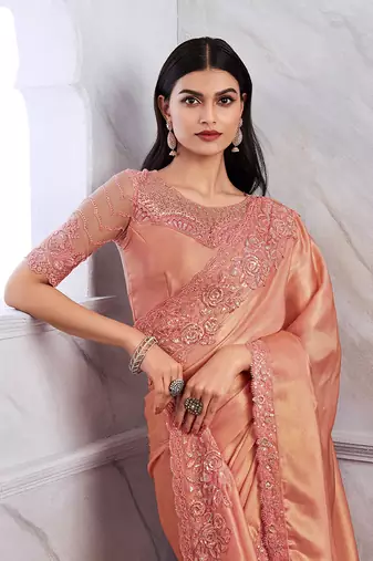 Peach colour shimmer silk blend embroidered saree