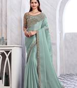 Sky blue colour satin silk festival sarees by monjolika fashion