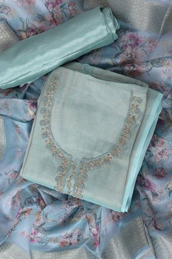 Green embroidered unstitched dress material