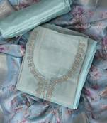 Green embroidered unstitched dress material