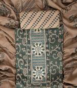 Green embroidered unstitched dress material