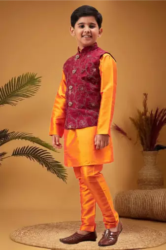 Boy's maroon nehru jacket with orange kurta and pyjama set