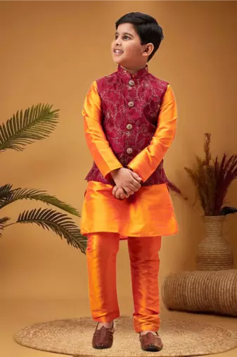 Boy's maroon nehru jacket with orange kurta and pyjama set