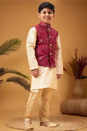 Boy's maroon nehru jacket with gold kurta and pyjama set