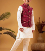 Boy's maroon nehru jacket with cream kurta and pyjama set