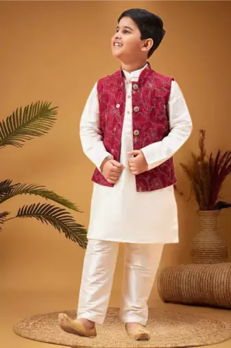 Boy's maroon nehru jacket with cream kurta and pyjama set