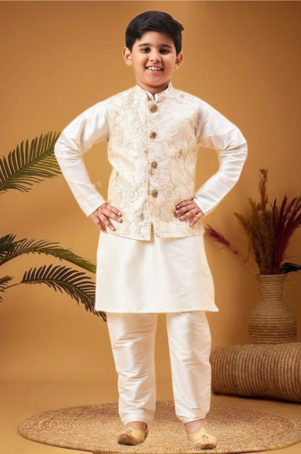 Boy's beige nehru jacket with cream kurta and pyjama set