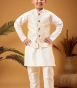Boy's beige nehru jacket with cream kurta and pyjama set