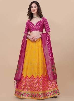 Yellow Brocade Fabric Lehenga & Unstitched Blouse With Dupatta 1
