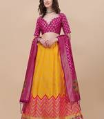 Yellow Brocade Fabric Lehenga & Unstitched Blouse With Dupatta